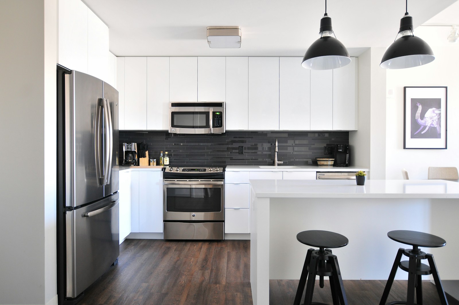 gray steel 3-door refrigerator near modular kitchen, apartment, renters insurance